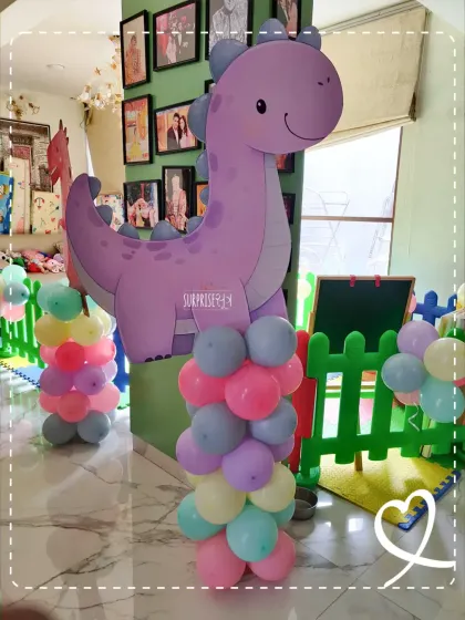 A purple dinosaur friend to go with the unicorn theme! I love mixing and matching elements to create a truly unique and playful party environment for the kids.