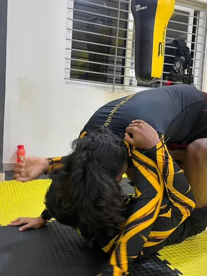 A dynamic grappling exchange during a live roll. Our members learn to adapt and react in real-time.