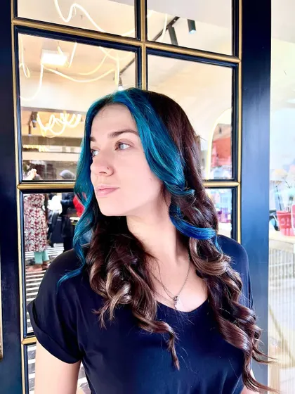 A side view of the blue highlights, showing how they frame the face and add a surprising pop of color.
