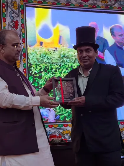 Another shot of me receiving the award at the Aarogya Mela. The event was a huge success, and being honored by Shri Mangal Pandey ji was a true privilege.