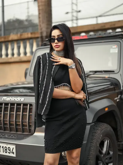 A variation of the pose, showing a different attitude.