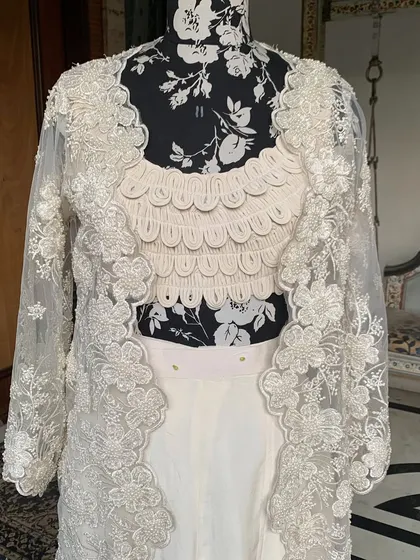 Another look at the jacket and blouse combination. The details on this set are what make it so special.