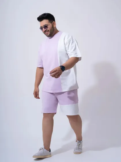 An e-commerce photo of a men's co-ord set. The simple, effective lighting and posing highlight the product's features and fit.