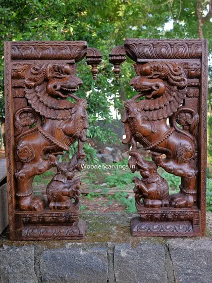 A pair of magnificent 36-inch Yaazhi brackets with a dark, waxy finish.