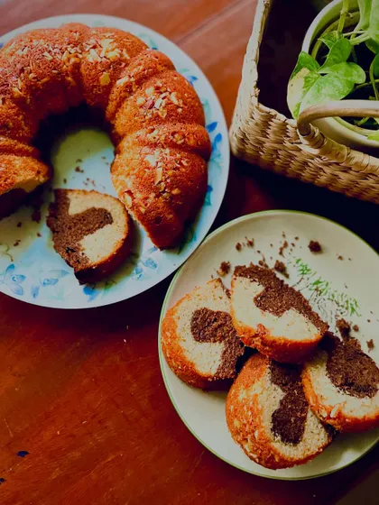 A beautiful flat lay of the marble bundt cake and several cut slices. It's as delicious as it is photogenic.