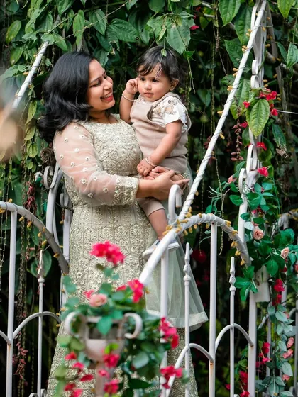 Our studio is designed to capture beautiful moments with the entire family. These images show how parents and grandparents can join the fun, creating cherished family portraits.