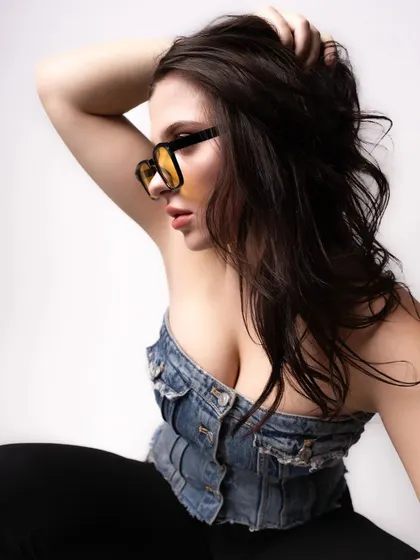 A profile view from the denim studio shoot. Capturing different angles is key for a comprehensive model portfolio, showcasing features from all sides.