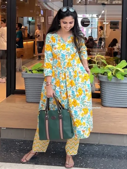 Another look at our exquisite yellow floral Kurta-Pant set, perfect for adding a touch of festive elegance to your day.