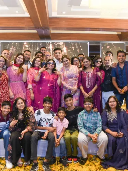 A full family photo on the stage, a wonderful memory of the event.