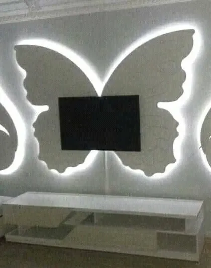 Your TV wall doesn't have to be boring. I designed and built this unique butterfly-shaped gypsum TV unit, complete with backlighting to make it a captivating piece of wall art that also serves a practical purpose.