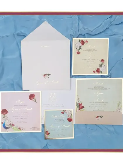 A dreamy and enchanting invitation suite in ivory and pastels. Each card for the different events features soft watercolor backgrounds and delicate floral illustrations, creating a cohesive and romantic story.