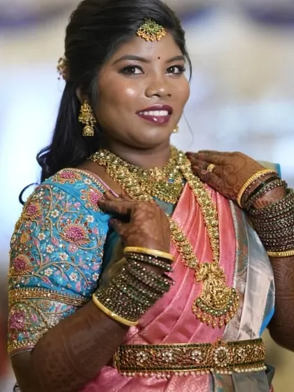 Another beautiful shot of our client Jacintha. The jewellery perfectly complements her pink and blue Kanjeevaram saree.