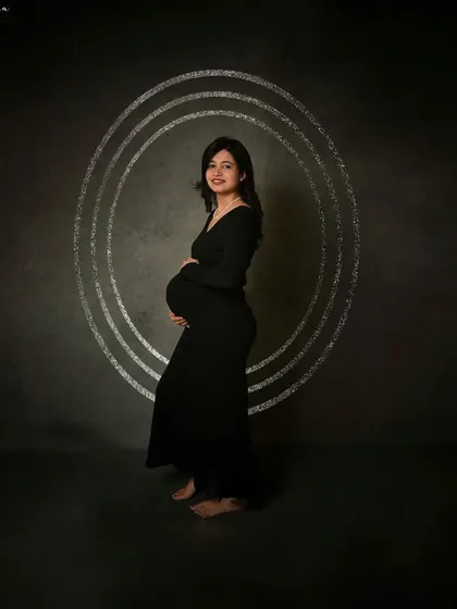 Another variation with digital background elements, showing how we can customize your portraits to add a unique artistic touch.