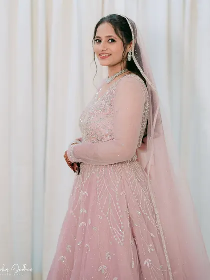 A classic side-profile portrait of the bride on her engagement day.