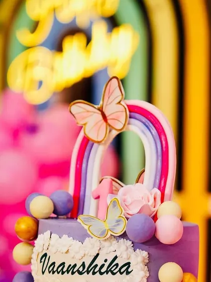 A duplicate image of the beautiful butterfly-themed cake, showing the intricate details that tie into the overall party design.