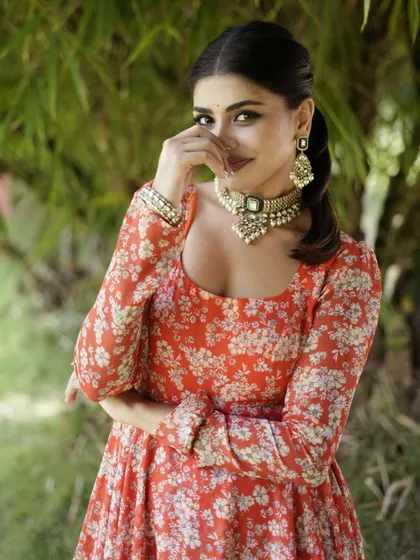 A playful close-up in the orange floral Anarkali.