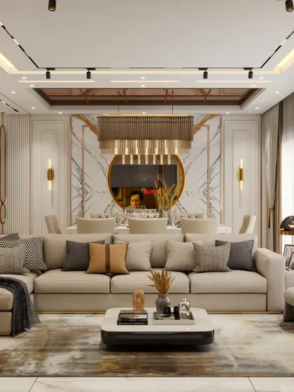 This is a 3D render of a luxurious living and dining room we designed. It features a stunning marble-clad wall, a large L-shaped sofa, and a sophisticated dining area with a statement chandelier. This design is all about creating a grand and opulent feel.