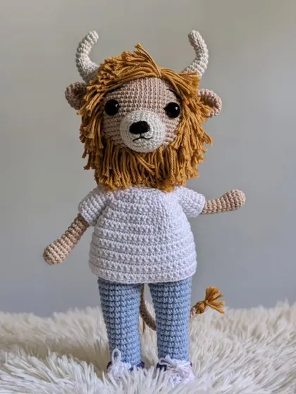 A full-body shot of the custom lion character without his glasses.