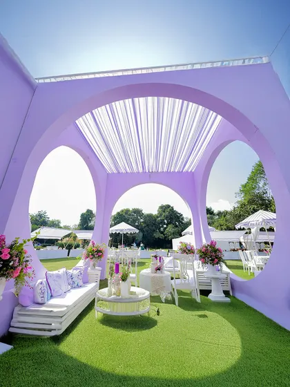 Another view of the beautiful lavender lounge, showcasing how the structure frames the outdoor scenery. I focus on creating decor that is not only beautiful but also functional and experiential.