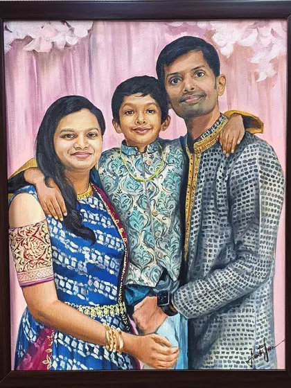 A beautiful family of three, captured in their traditional Indian attire. I paid close attention to the intricate patterns on their clothes to make this portrait truly special.