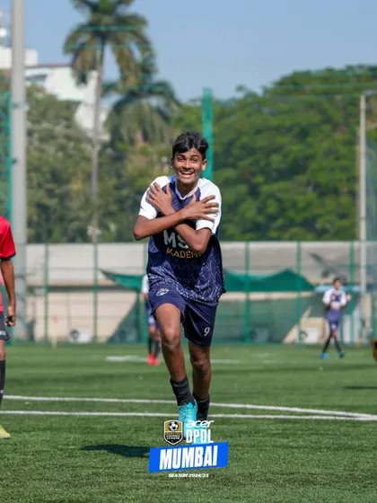 A player celebrates a goal with the classic "ice in my veins" pose.