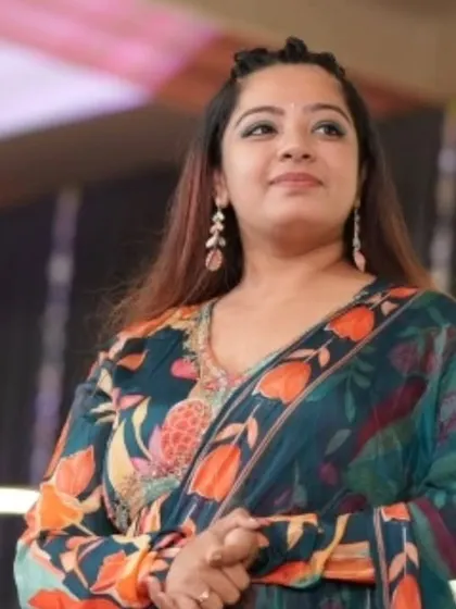A candid shot capturing my focus and engagement while hosting a Sangeet. I am always tuned into the audience, ready to adapt and keep the energy high throughout the night.