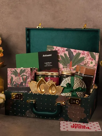For the bougie princess in your life. This luxurious green velvet trunk is filled with high-end goodies for an extravagant gifting experience.
