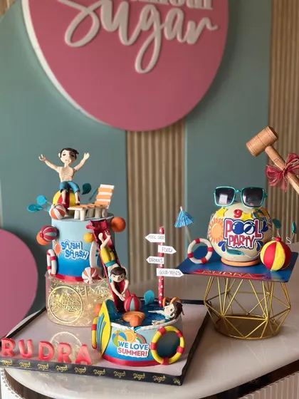 Pool vibes, but make it cake! Our summer-themed cakes bring the sunshine to your party, with designs featuring beach scenes, ocean waves, and fun caravan toppers.