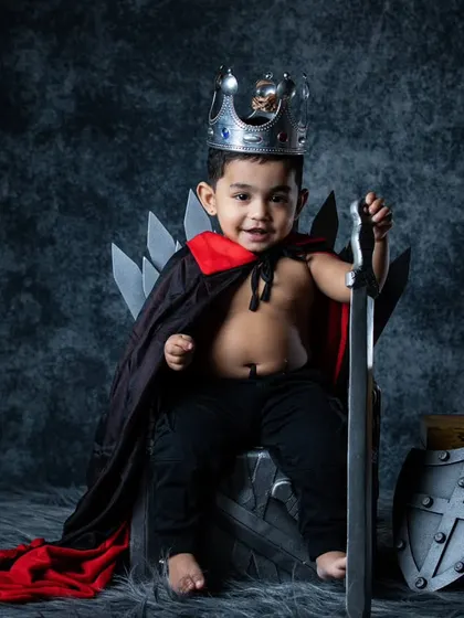 A powerful pose from our little king, looking regal and ready for his royal duties.