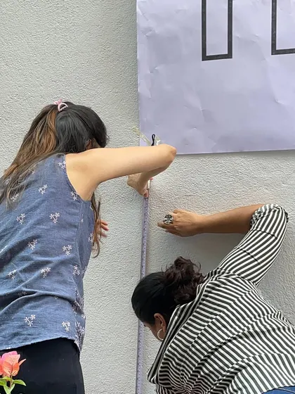 The process of creating the Kinara Capital mural required careful measurement and teamwork from my crew before the 300 employees even arrived. We handle every detail to ensure a flawless experience.