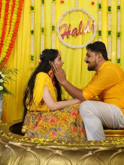 A tender moment between the bride and groom during their Haldi. Amidst all the fun and games, we make sure to capture the quiet moments of love.
