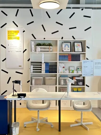 A modern and clean dual workstation from IKEA, showing how effective simple, well-organized furniture can be. The white and blue color scheme is fresh and motivating.