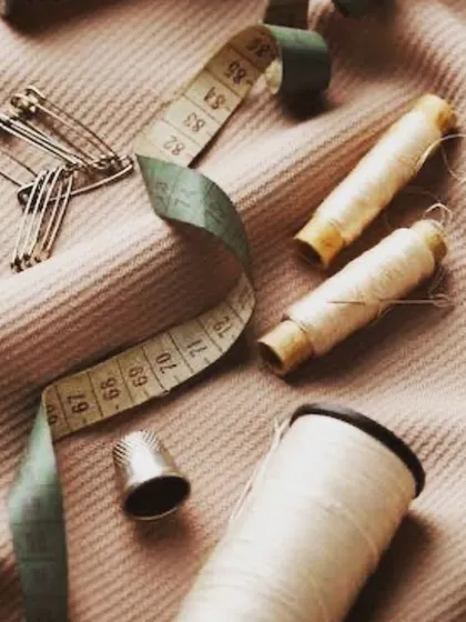 The tools of my trade: thread, needles, measuring tape, and scissors. These simple items are what allow us to create garments of exceptional quality and fit.