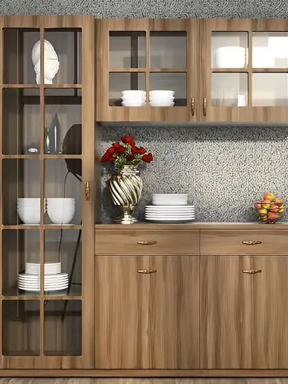 A classic, freestanding crockery cabinet in a light wood finish. This traditional piece offers ample storage with a glass-door hutch for display and a solid buffet base.