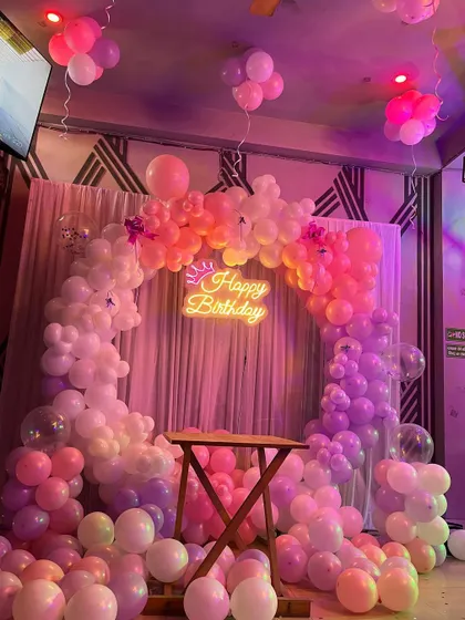 The decoration with the cafe's ambient lighting, creating a warm and inviting atmosphere.