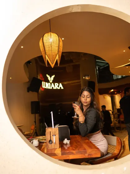 Finding a cozy corner to enjoy the music and a drink. The unique architecture of Lumara provides the perfect backdrop for our rooftop sessions.