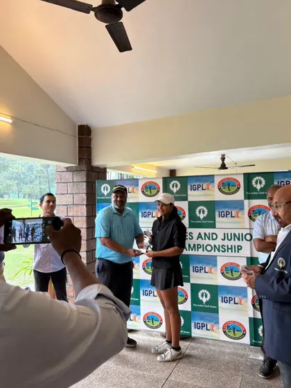 Another angle of Rashi Mishra being presented with her Runner-up award at the IGU All India Finals, captured during the prize distribution ceremony.