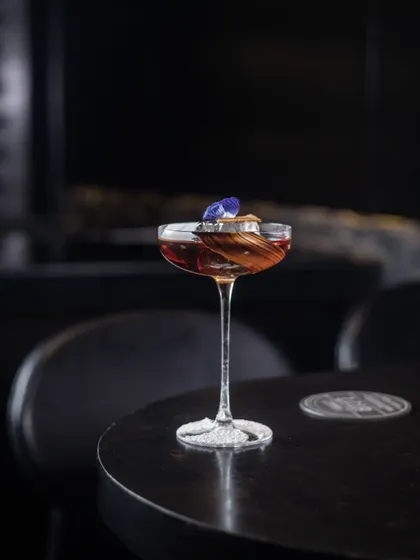 Inspired by the hills of South India, our 'Nilgiri' cocktail features Smoky Whiskey, coffee, and lavender milk with vermouth. It has a smooth, buttery finish with a distinct lavender nose.