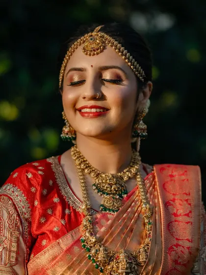 The happy smile of a bride on her big day. This close up shows the flawless HD makeup finish, perfect for wedding photography.