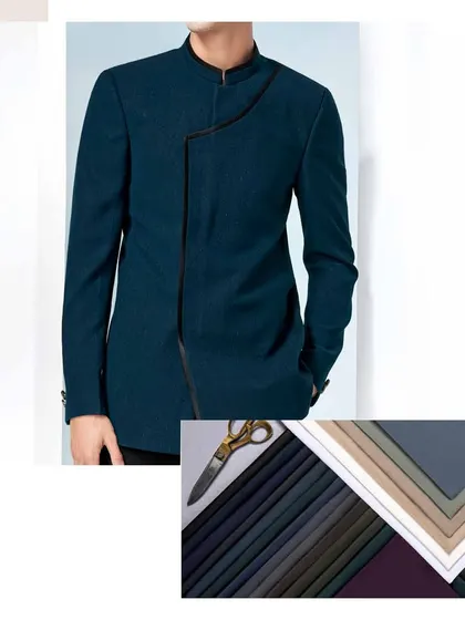 Explore our latest collection of fabrics and designs. This image pairs an assortment of our premium suiting materials with a modern, asymmetrical blue jacket.