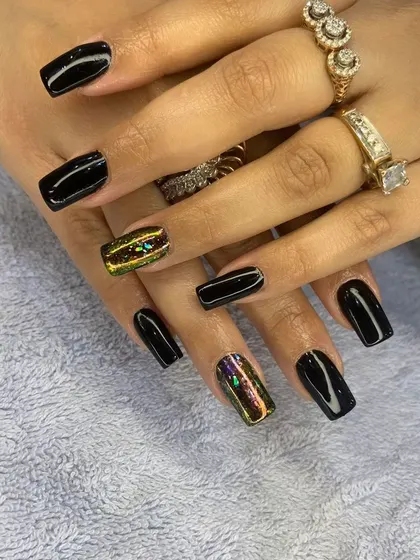 A full view of the chic black and multi-chrome cat eye set, perfect for a bold and modern look.