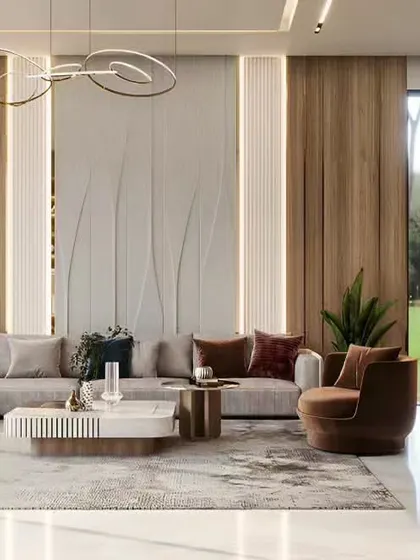 We designed this expansive living area with an open-concept layout, perfect for modern lifestyles. The space features a large sectional sofa, elegant wall paneling with integrated lighting, and a seamless flow into the dining and bar area.