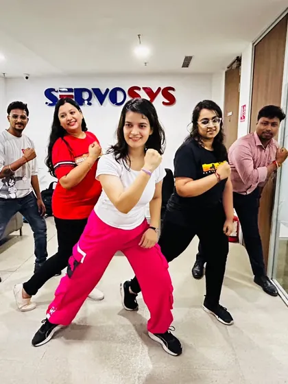 A powerful pose from the team at Servosys Solutions after an energetic Zumba session. It's amazing to see colleagues turn into a fitness squad, ready to take on the rest of the day.