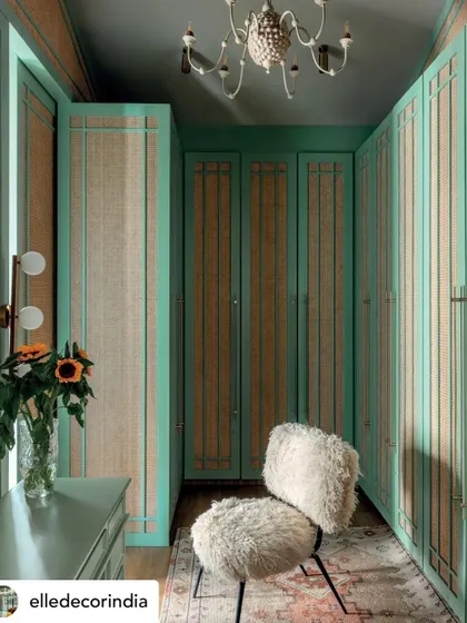 A duplicate of image 50, showing the vibrant and bespoke walk-in closet at Summer Haus from our Elle Decor feature.