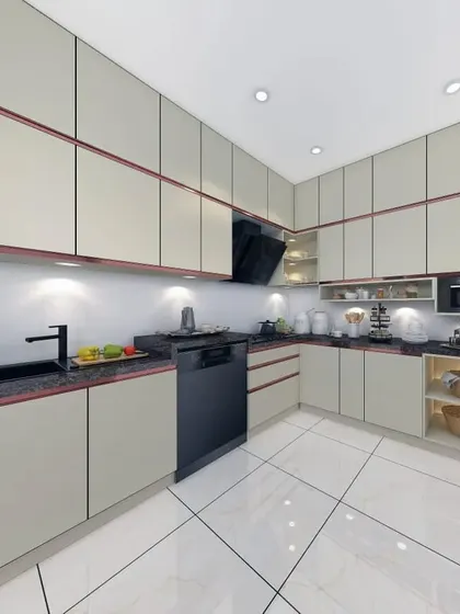 A wider view of the cream and rose gold kitchen, showing the built-in oven and microwave tower. The design is both elegant and highly practical.