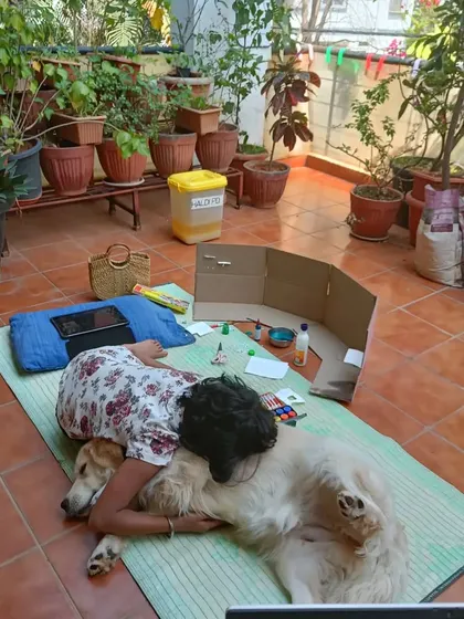Our sunny patio is the perfect place for our granddaughter and our guests to lounge and share secrets. Here she is cuddling with a sweet Golden Retriever. It's beautiful to see the special bond that forms between children and dogs.
