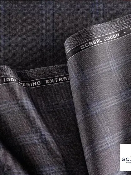 This is a Super 100's Merino Extrafine wool from Scabal London, a fabric renowned for its softness, durability, and beautiful drape. Choosing a premium fabric like this is the first step to a truly magnificent suit.