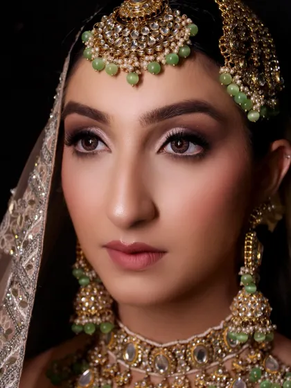 Another angle of this beautiful modern bride. The focus was on creating a flawless base and enhancing her features with soft, blended tones.