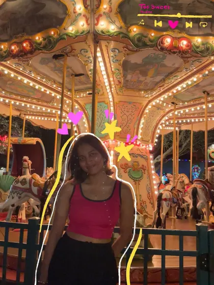 This song is stuck in my brain. A photo by a carousel with doodles inspired by the song "Too Sweet."