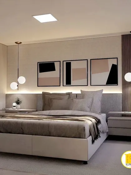 A modern bedroom with abstract art and globe pendant lights, creating a chic and stylish look.